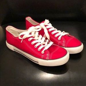 Red converse style tennis shoes